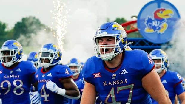 Sep 3, 2021; Lawrence, Kansas, USA; Kansas Jayhawks fullback Jared Casey (47) takes the field before the game against the South Dakota Coyotes at David Booth Kansas Memorial Stadium. Mandatory Credit: Jay Biggerstaff-USA TODAY Sports